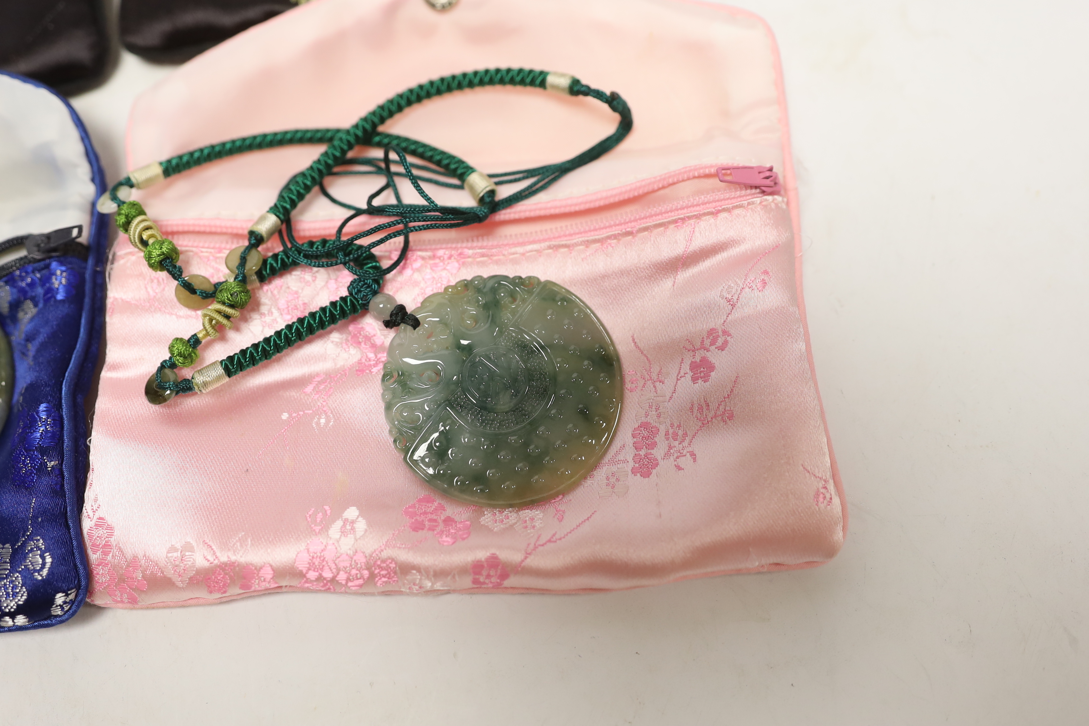 Four Chinese jadeite pendants